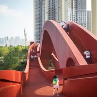 The WAF-nominated Lucky Knot bridge rises and falls while traversing the Dragon King Harbour River in the Chinese megacity of Changsha. Photo: Julien Lanoo