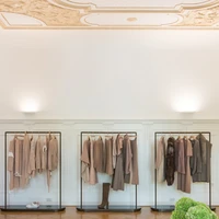 The track-mounted fbl spotlight (top; Dior flagship store, Malaysia) is one of mawa’s bestsellers, while the one-piece 8 uplight (above) is a new addition to the portfolio. Both are milled out of a single piece of metal and folded to form a rectangle