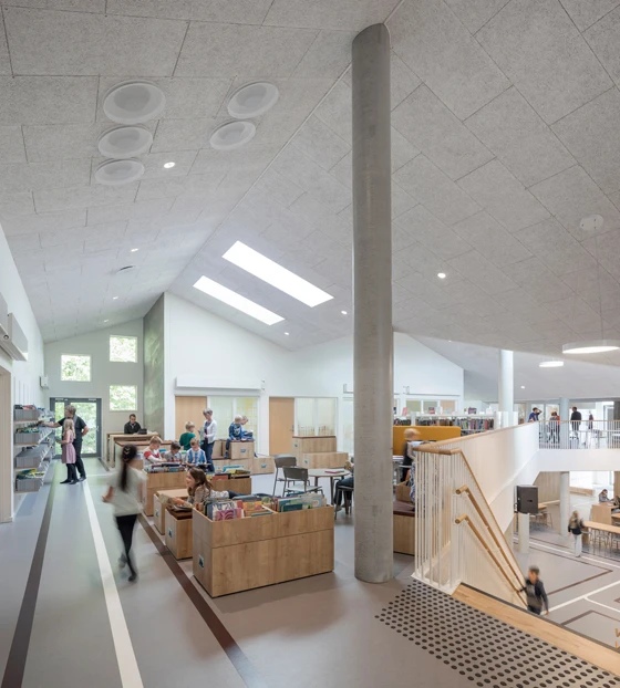 The archetypal shape and almost miniature scale of this school are intended to create a welcoming atmosphere for the 650 children who come to learn there each day. Photos: Adam Mørk