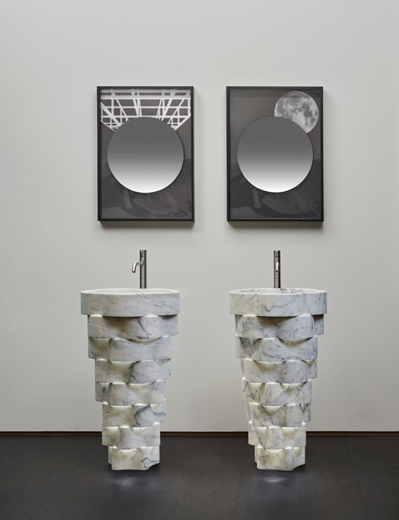 Above: the minimalist Calice basin, which emerges in a ghostly fashion from the wall. Above: the new marble Intreccio washbasin features concentric yet staggered rings