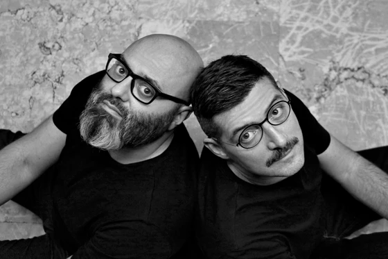 Top: the showroom’s elegant entrance. Above: Paolo Brambilla (left) and Fabio Calvi of Calvi Brambilla redesigned the showroom in collaboration with Andrea Lupi