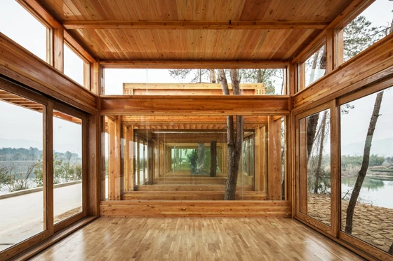 The wooden structure of DnA Design and Architecture's Pine Park Pavilion in Lishui, China, is a reference to the area's traditional resin extraction. Photos: Ziling Wang